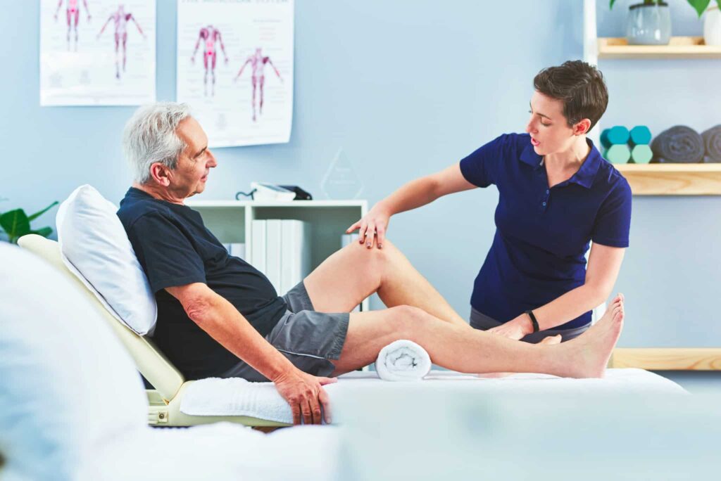 Man receiving physiotherapy treatment